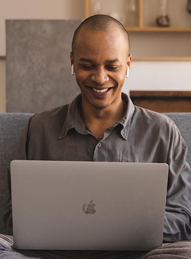 Man using Measurement-Based Care Assessments at home